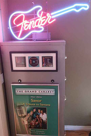 FIling cabinet with Fender sign, poster